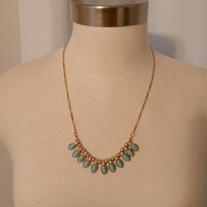 Pretty turquoise stone and rhinestone gold colored